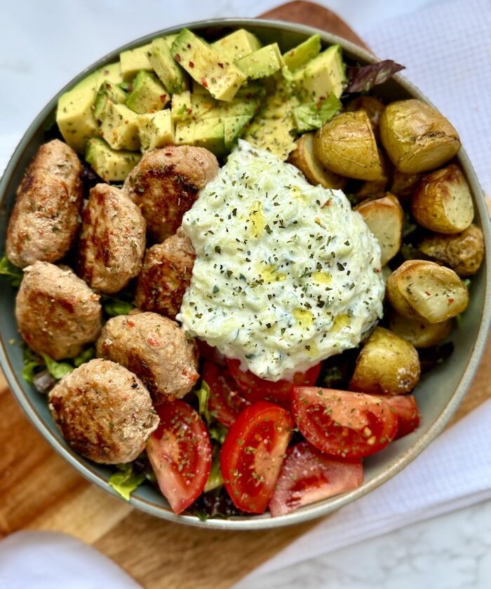 Chicken Meatball Bowl with Roasted Potatoes, Avocado, Tomatoes & Tzatziki Sauce